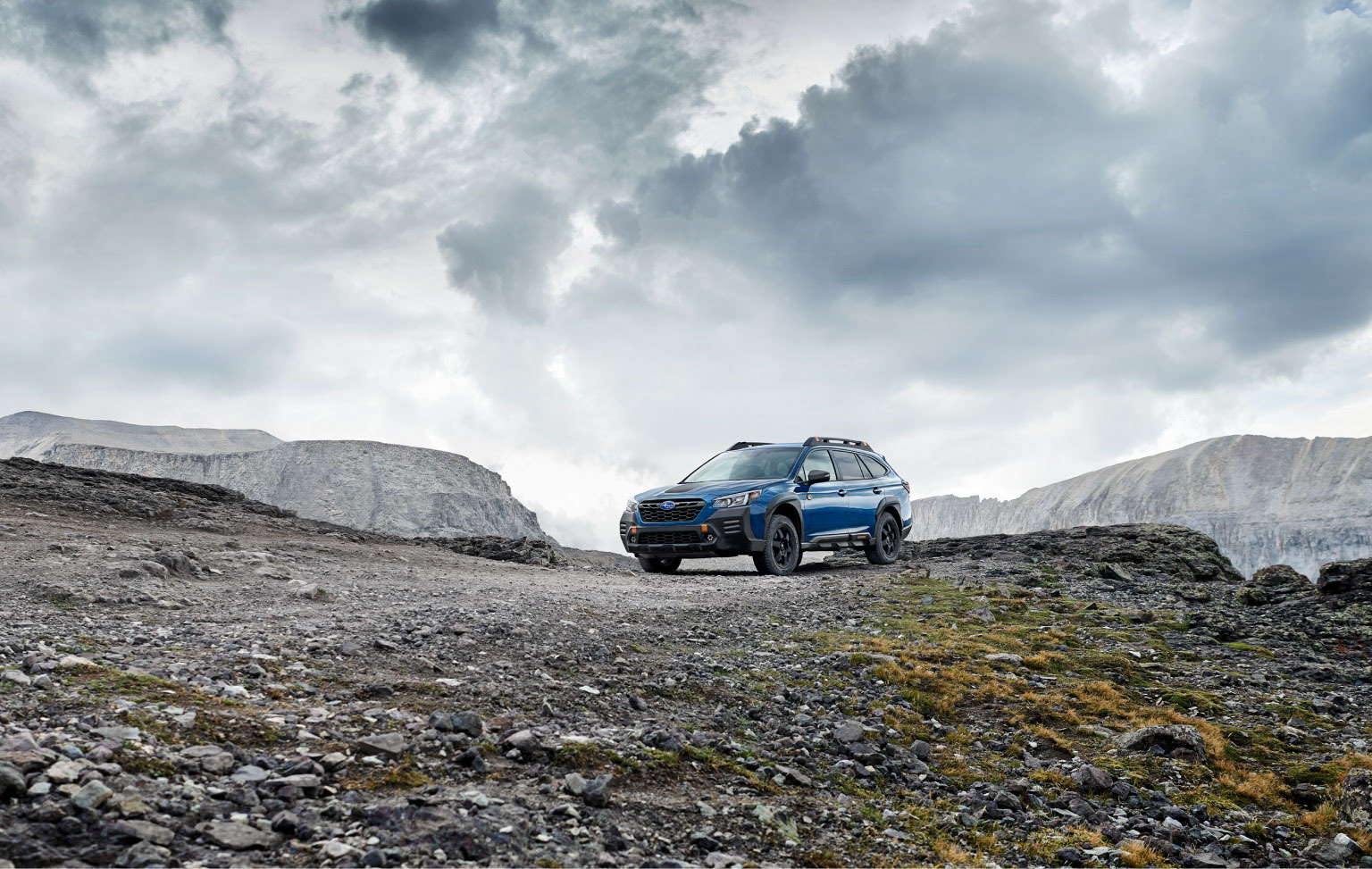 automotive retouching and background post-production of a subaru continental in a rocky mountain landscape