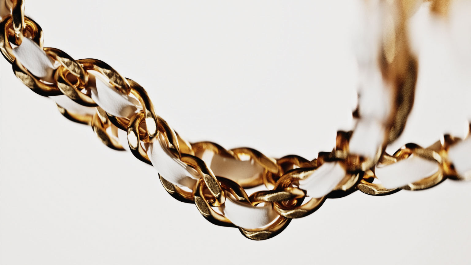 coco chanel photorealistic cgi closeup of gold metal chain on luxury brand bag